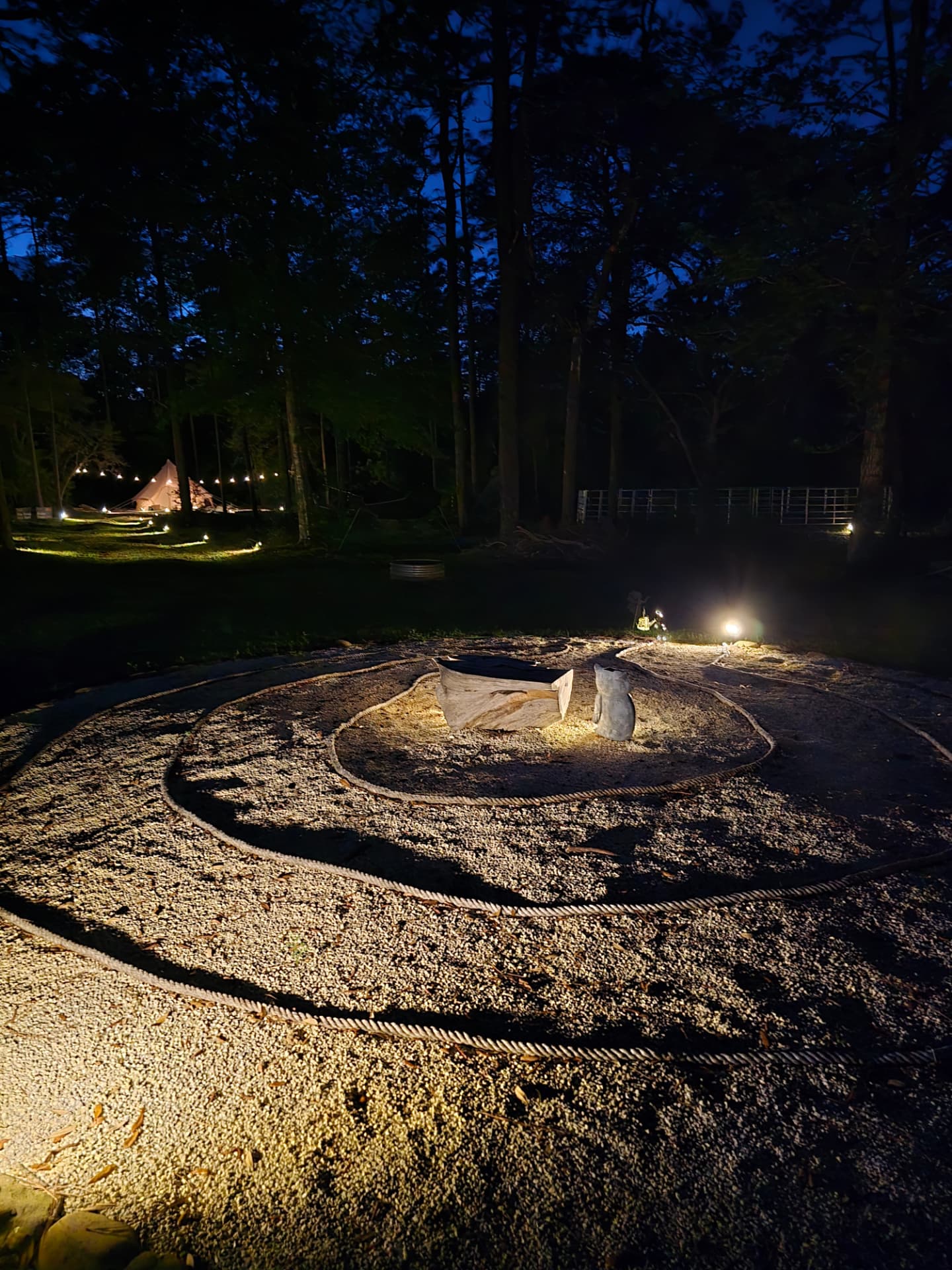 The meditation labyrinth lit at night